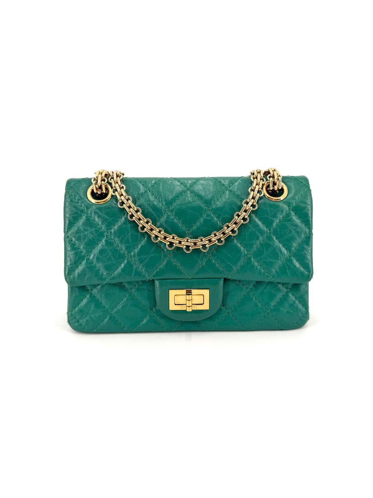 Chanel Reissue 2.55 Mini flap bag in green quilted aged calfskin leather with gold-tone hardware, Mademoiselle turnlock, and chain shoulder strap.