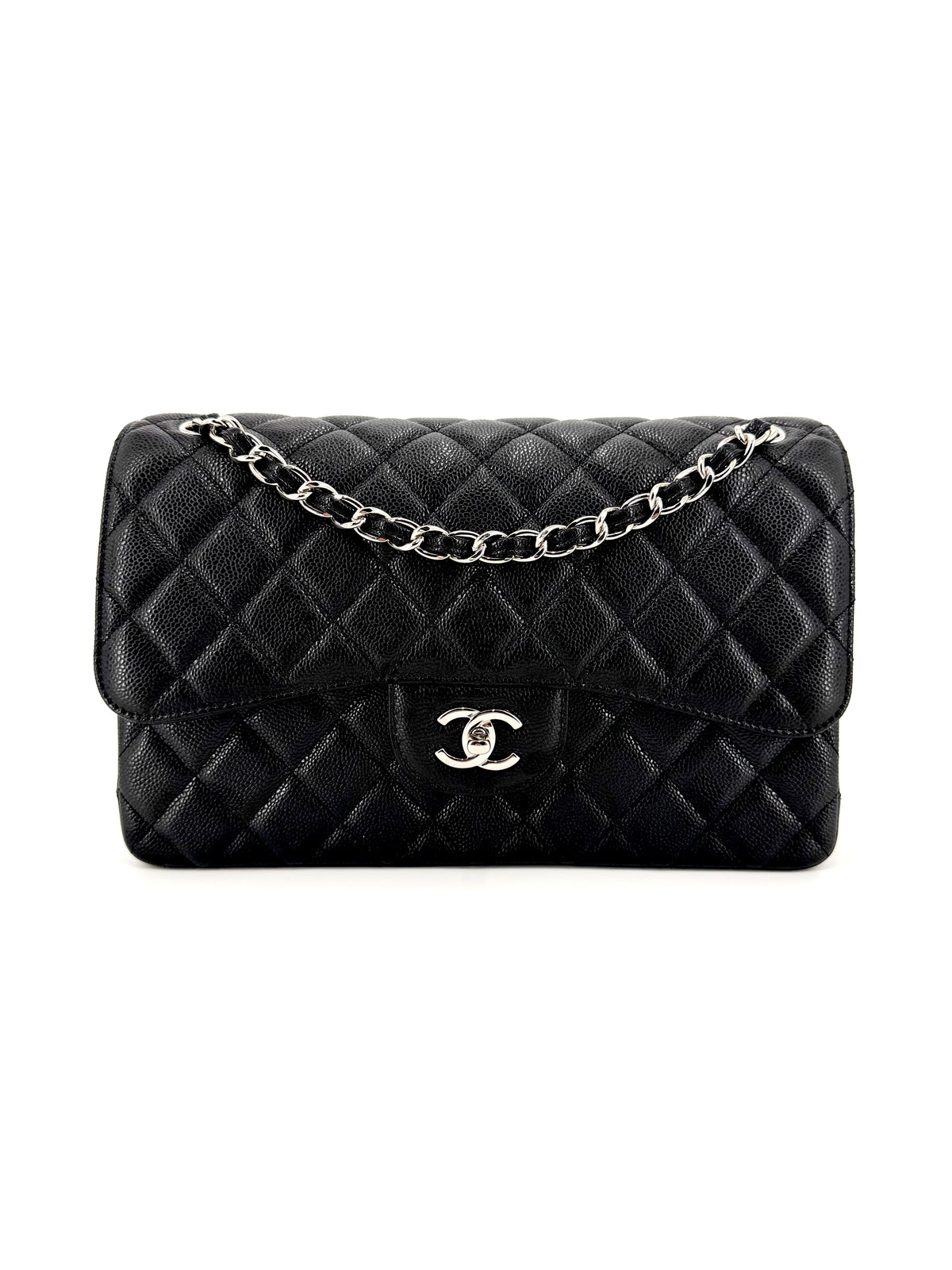 Pre-Owned Chanel Classic Jumbo Double Flap Bag in black diamond-quilted caviar leather with silver hardware, CC turn-lock and chain shoulder strap