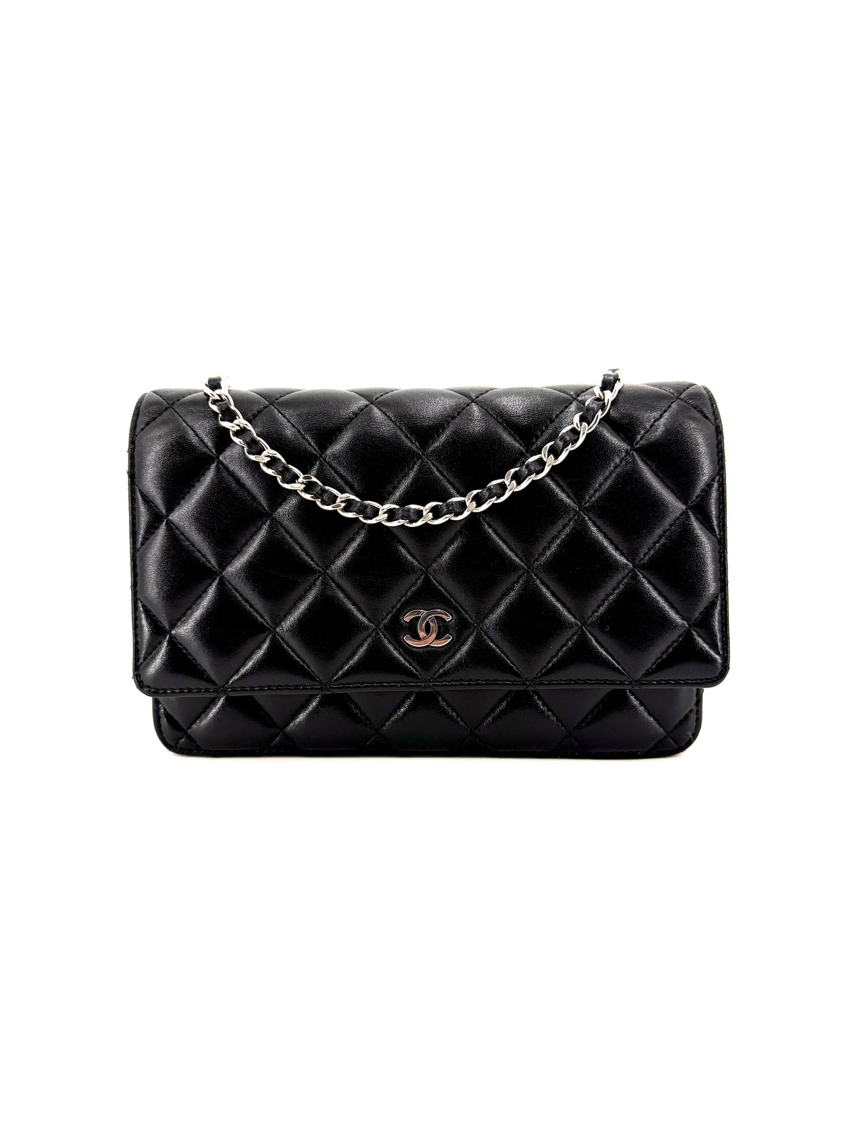 Authentic Chanel Classic Wallet on Chain in black diamond-quilted lambskin leather with silver-tone interlocking CC logo, magnetic flap closure, and leather-interwoven chain strap.
