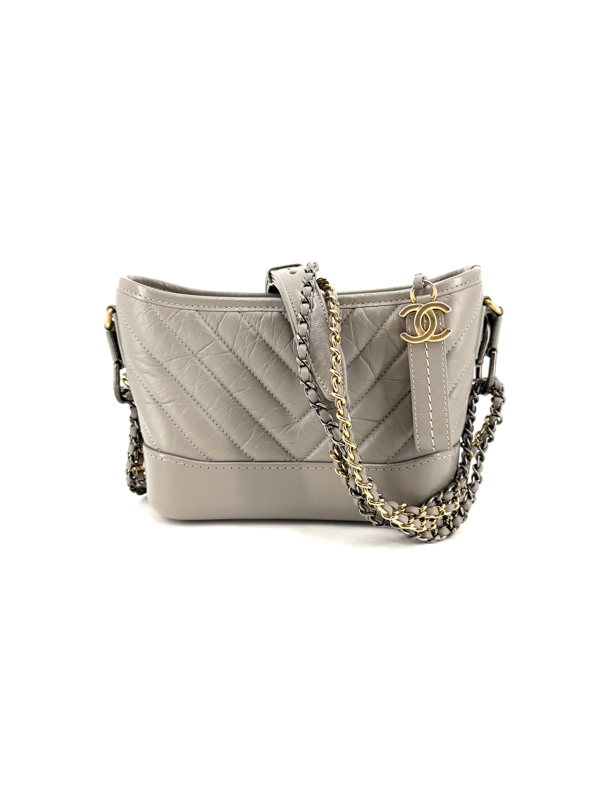 Pre-owned, authenticated Chanel Small Gabrielle Bag in gray chevron-quilted leather with mixed-metal chain straps and structured base
