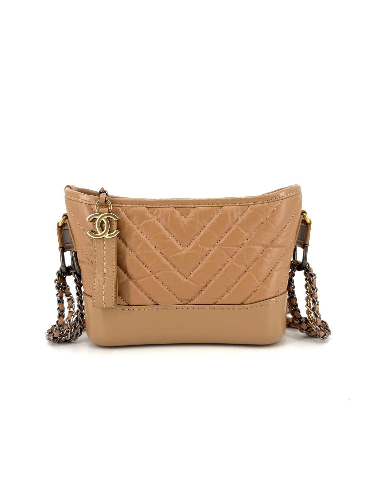 Authentic Chanel Gabrielle Small Hobo Bag in beige chevron-quilted aged calfskin leather with mixed metal chain straps, CC charm, and structured base.